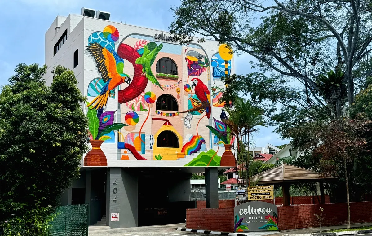 Outdoor communal space at Coliwoo Hotel Pasir Panjang, suitable for social events and relaxation.